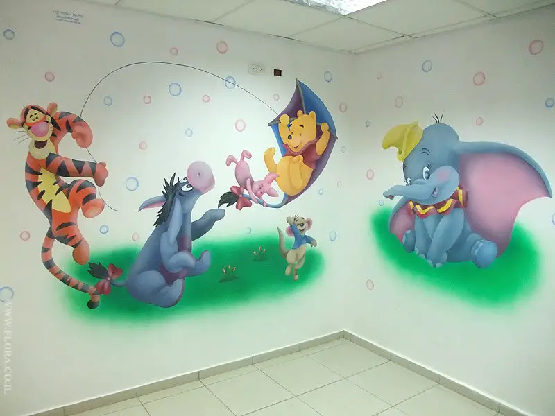 The wall in the children's room can be decorated with simple drawings based on your favorite cartoons